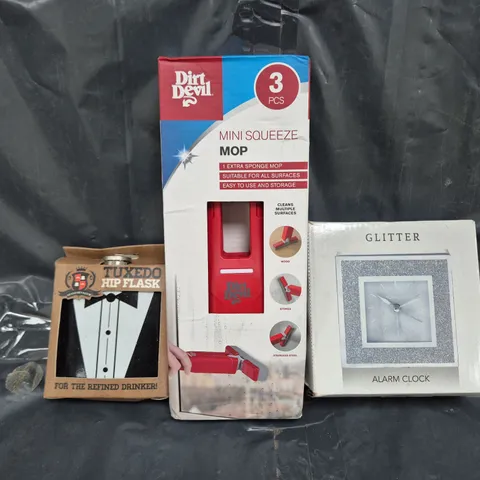 BOX OF APPROXIMATELY 10 ASSORTED HOUSEHOLD ITEMS TO INCLUDE GLITTER ALARM CLOCK, MINI SQUEEZE POP, TUXEDO HIP FLASK, ETC - COLLECTION ONLY
