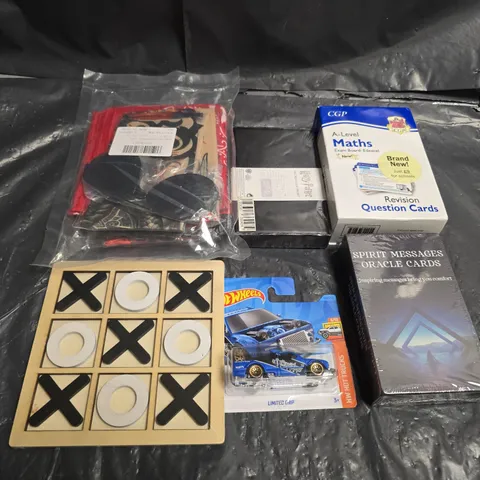 APPROXIMATELY 10 ASSORTED TOYS & GAMES PRODUCTS TO INCLUDE , HOT WHEELS , REVISION CARDS , PLAYING CARDS , ETC 
