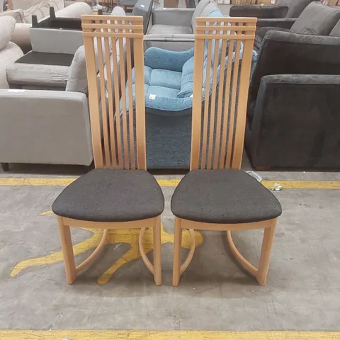 PAIR OF DESIGNER WOODEN HIGH BACK DINING CHAIRS WITH UPHOLSTERED PADDED SEATS