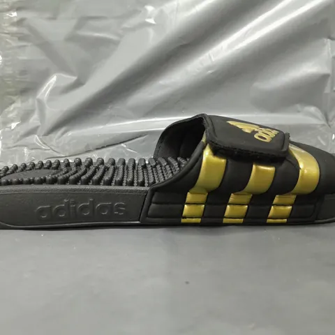 PAIR OF ADIDAS ADISSAGE SLIDERS IN BLACK/GOLD UK SIZE 9