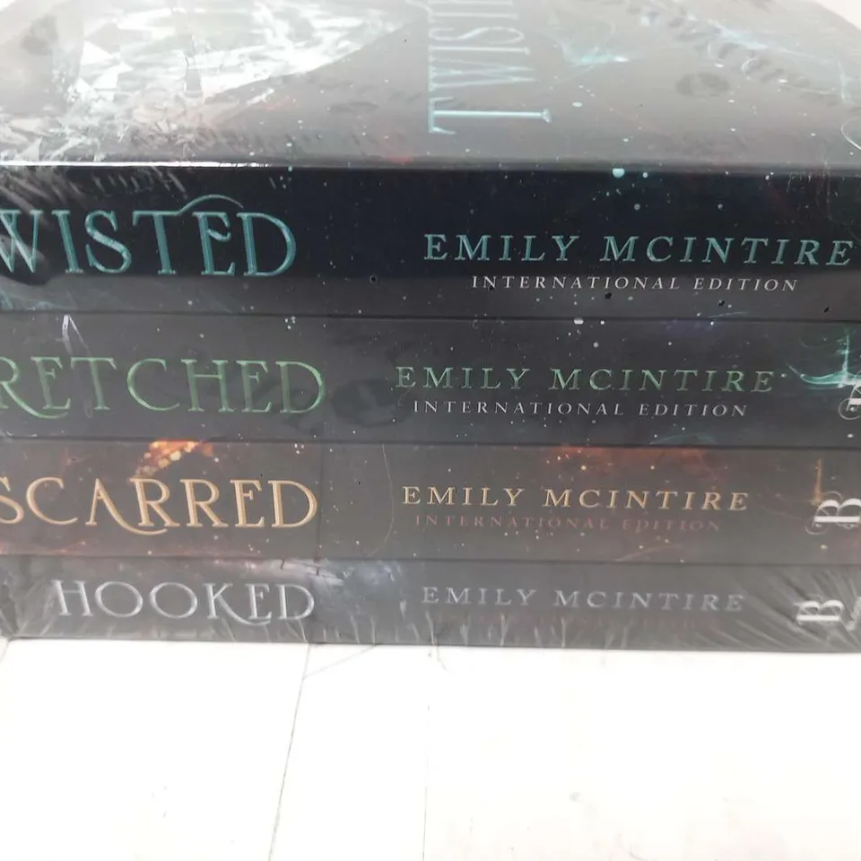 SEALED EMILY MCINTIRE COLLECTION TO INCLUDE; TWISTED, WRETCHED, SCARRED AND HOOKED