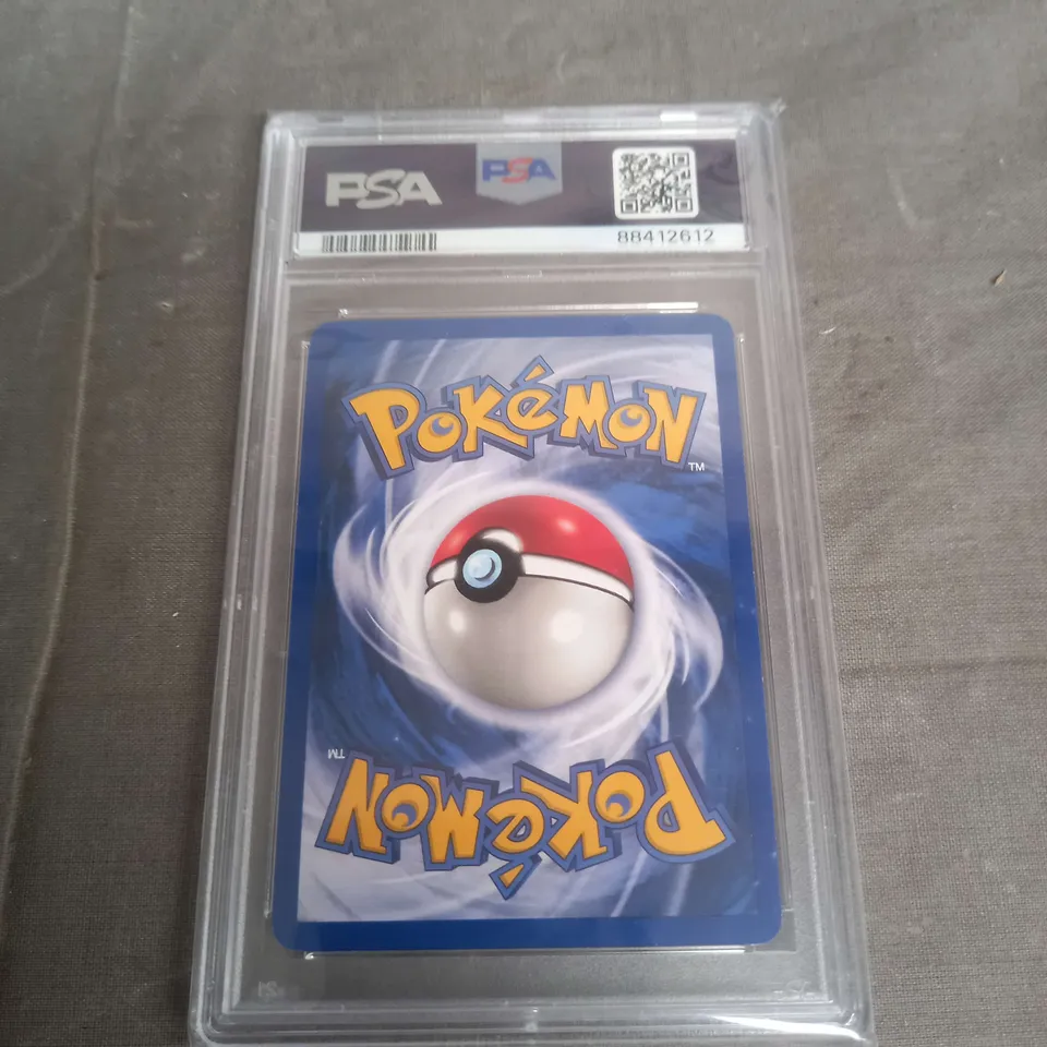 FRAMED AND GRADED COLLECTABLE TRADING POKEMON CARD - 2000 POKEMON ROCKET DARK MACHAMP - HOLO - PSA 7