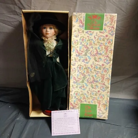 THE LEONARDO COLLECTION PORCELAIN DOLL IN VELVET GREEN OUTFIT – BOXED