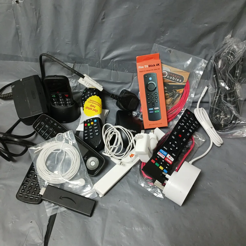 APPROXIMATELY 12 ASSORTED HOUSEHOLD ITEMS TO INCLUDE LANDLINE PHONE, TV REMOTE, LOOSE AMAZON FIRE STICK, ETC