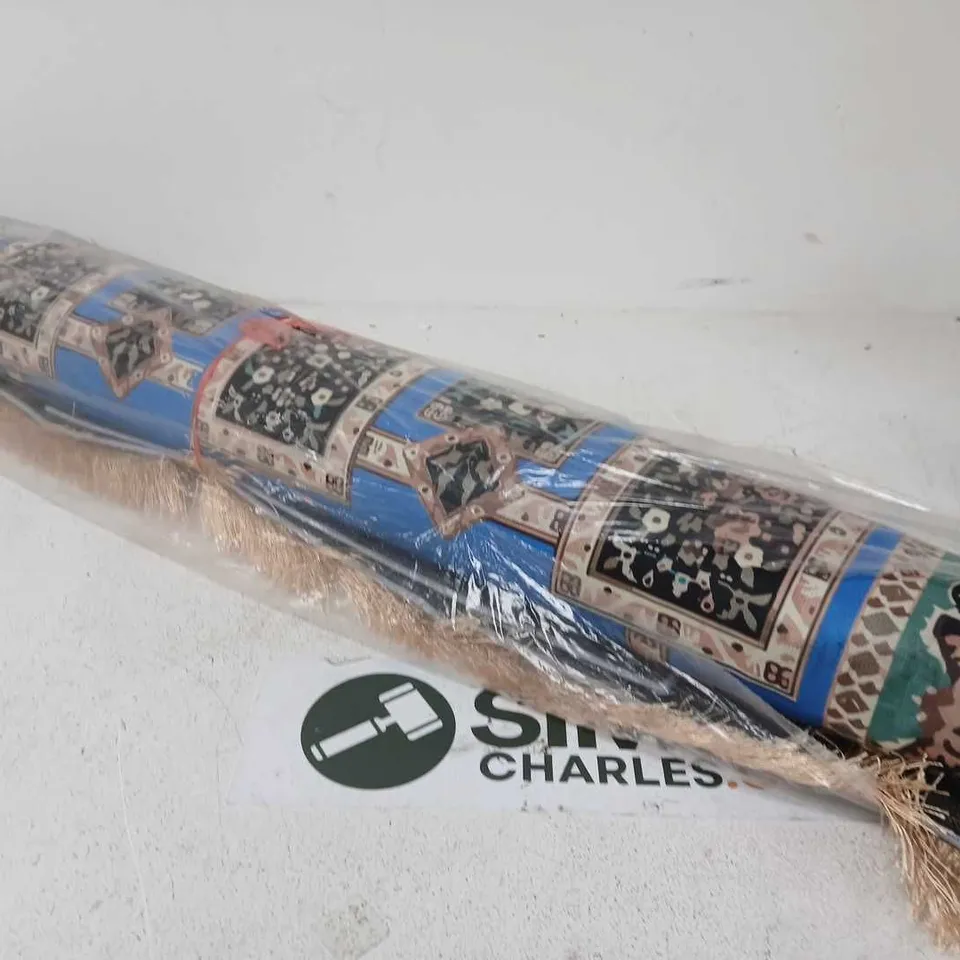 ROLLED ORIENTAL STYLE RUG WITH BLUE, CREAM AND GOLD PATTERN - LENGTH UNSPECIFIED 