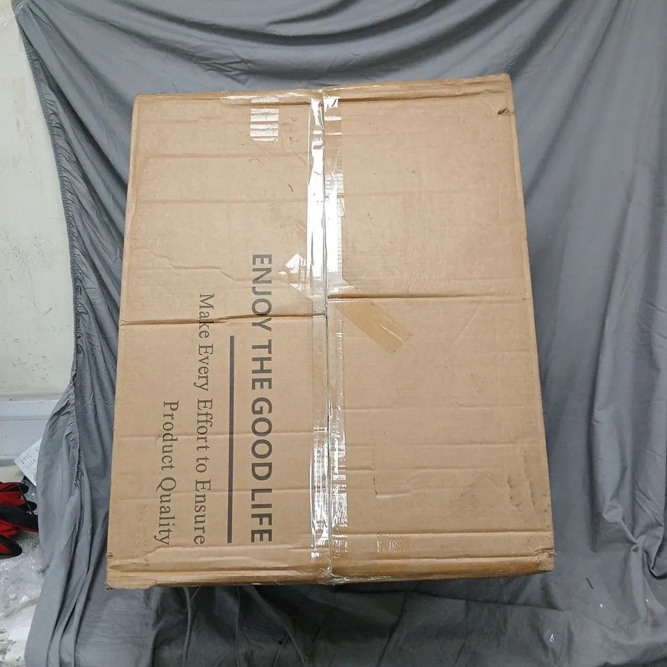 GREEN UPHOLSTERED CHAIR WITH BASE AND LEGS – WRAPPED IN PROTECTIVE PLASTIC