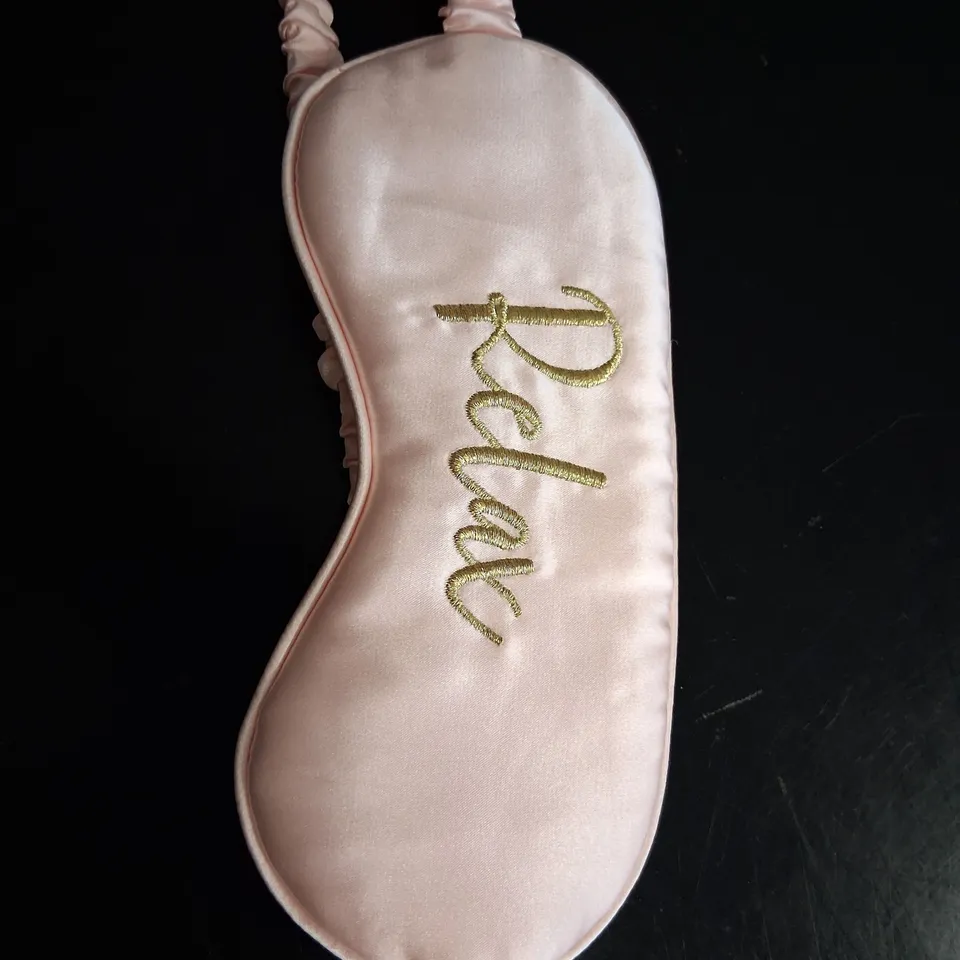 APPROXIMATELY 100 BRAND NEW 'RELAX' EYE MASKS