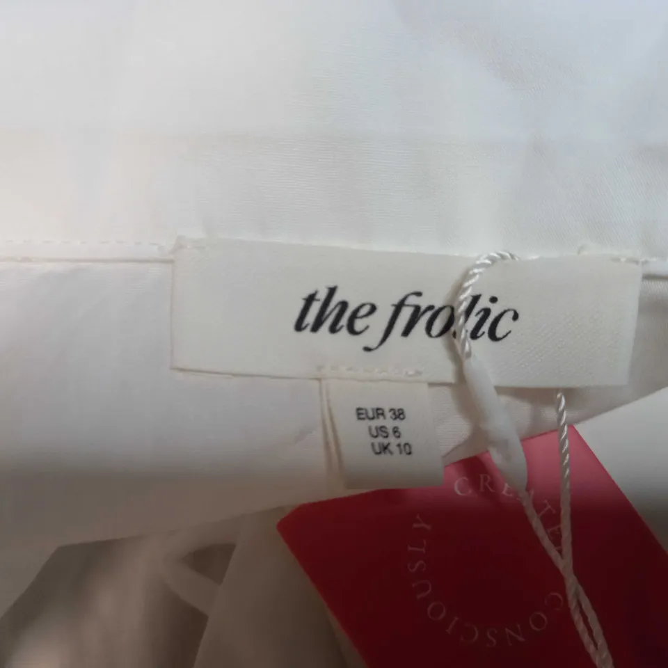 THE FROLIC WHITE BUTTON UP BLOUSE WITH FLARED SLEEVES - SIZE 10