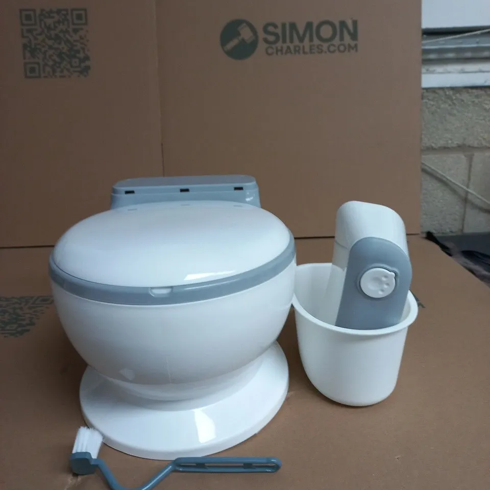PORTABLE CAMPING TOILET WITH A CLEANING BRUSH