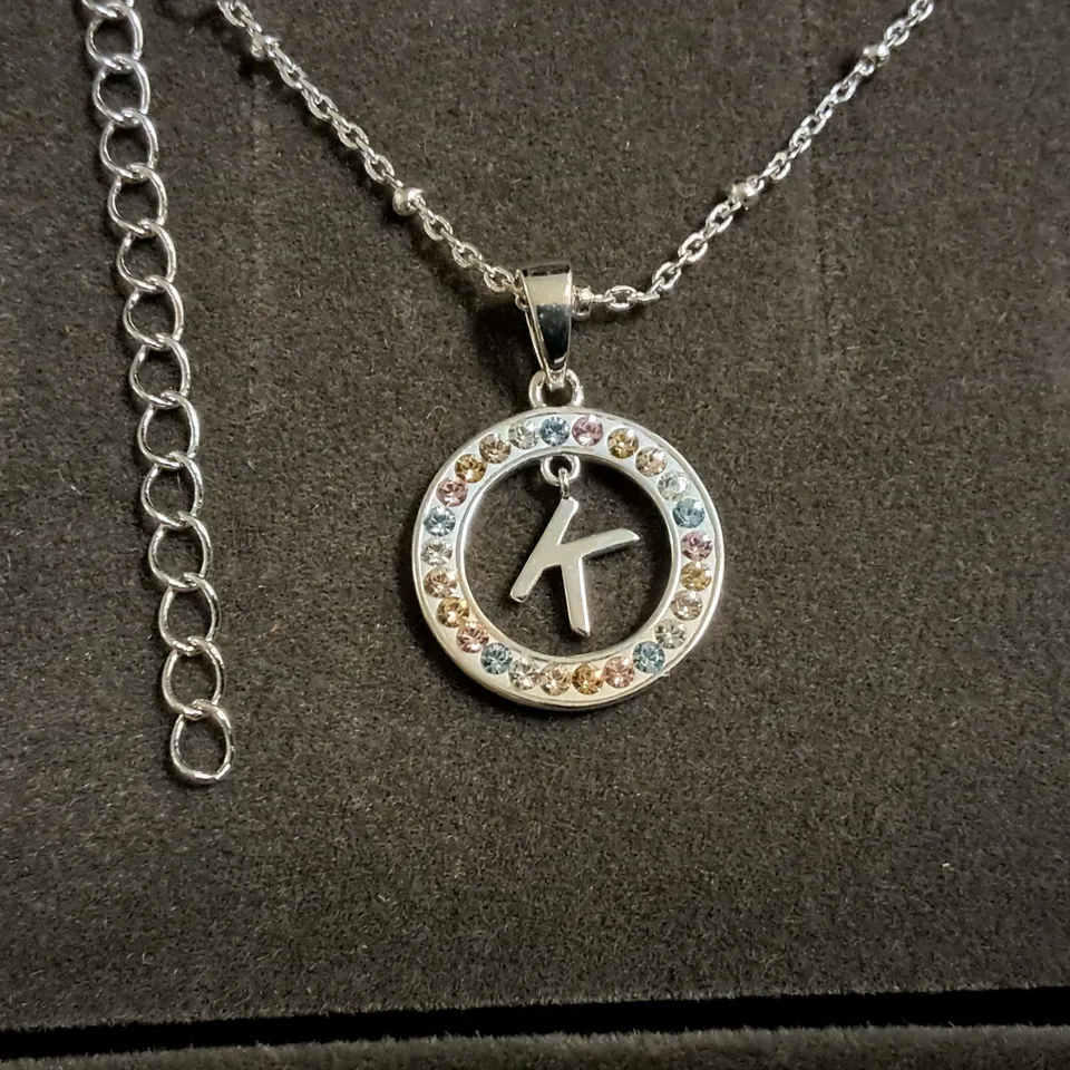 WARREN JAMES CIRCLE SURROUNDED K NECKLACE 