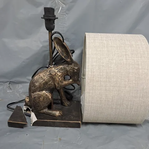 BOXED UNBRANDED RABBIT TABLE LAMP IN BRONZE EFFECT COLOUR