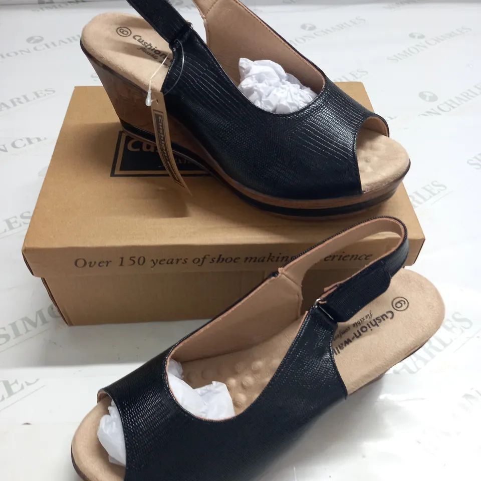 BOXED PAIR OF CUSHION WALK BLACK STRAPPY WEDGE HEELED SHOES - SIZE 6