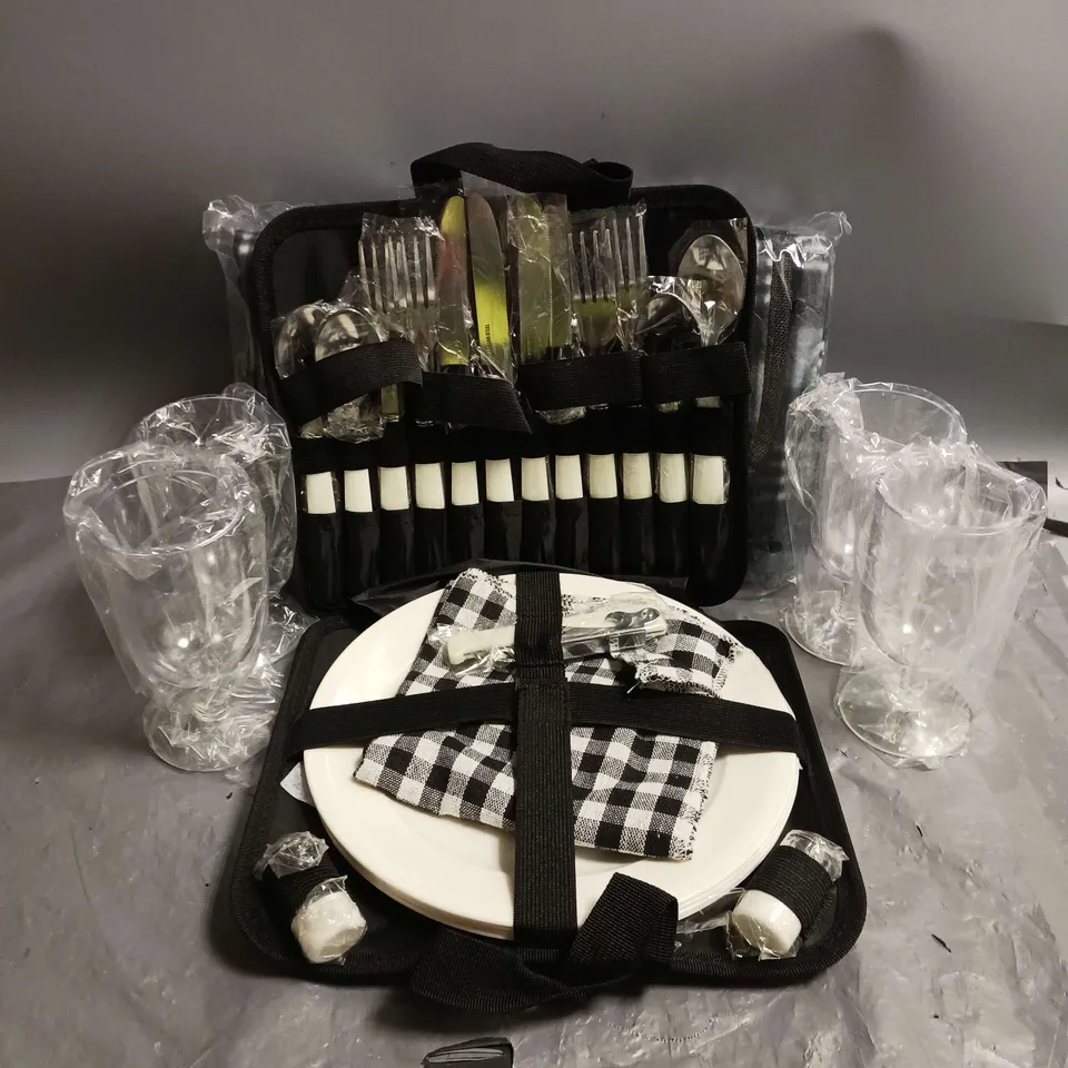 BOXED ZORMY PICNIC BACKPACK SET FOR 4 PEOPLE, INCLUDES COOLER BAG, BLANKET, CUTLERY, BOTTLE OPENER, WINE GLASSES AND PLATES.