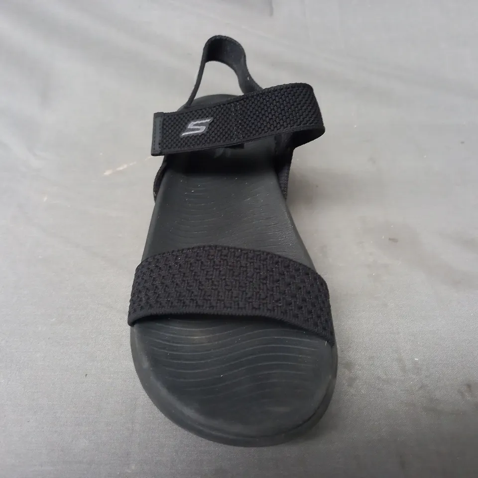 BOXED PAIR OF SKECHERS GO WALK OPEN TOE LOW WEDGE SANDALS IN BLACK SIZE 6