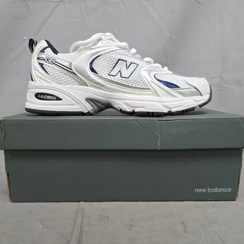 BOXED PAIR OF NEW BALANCE 530 TRAINERS IN WHITE/SILVER/NAVY SIZE UK 6