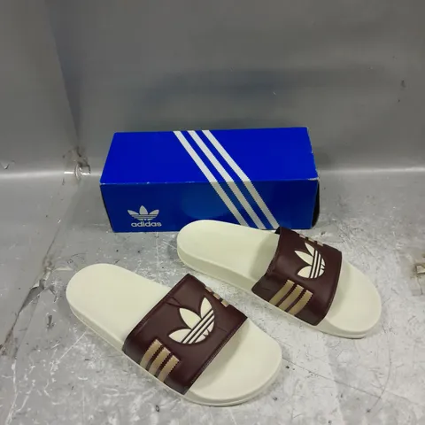 BOXED PAIR OF ADIDAS ADILETTE MAROON / CREAM SLIDES UK 10