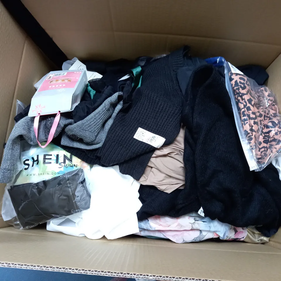 LARGE BOX OF ASSORTED CLOTHING ITEMS IN VARIOUS COLOURS AND SIZES INCLUDING TROUSERS , TOPS AND JUMPERS 