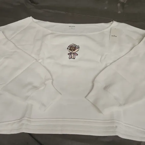 HOLLISTER SLOUCH SHOULDER BEAR/FLOWERS CROP JUMPER, WHITE - UK SIZE MEDIUM
