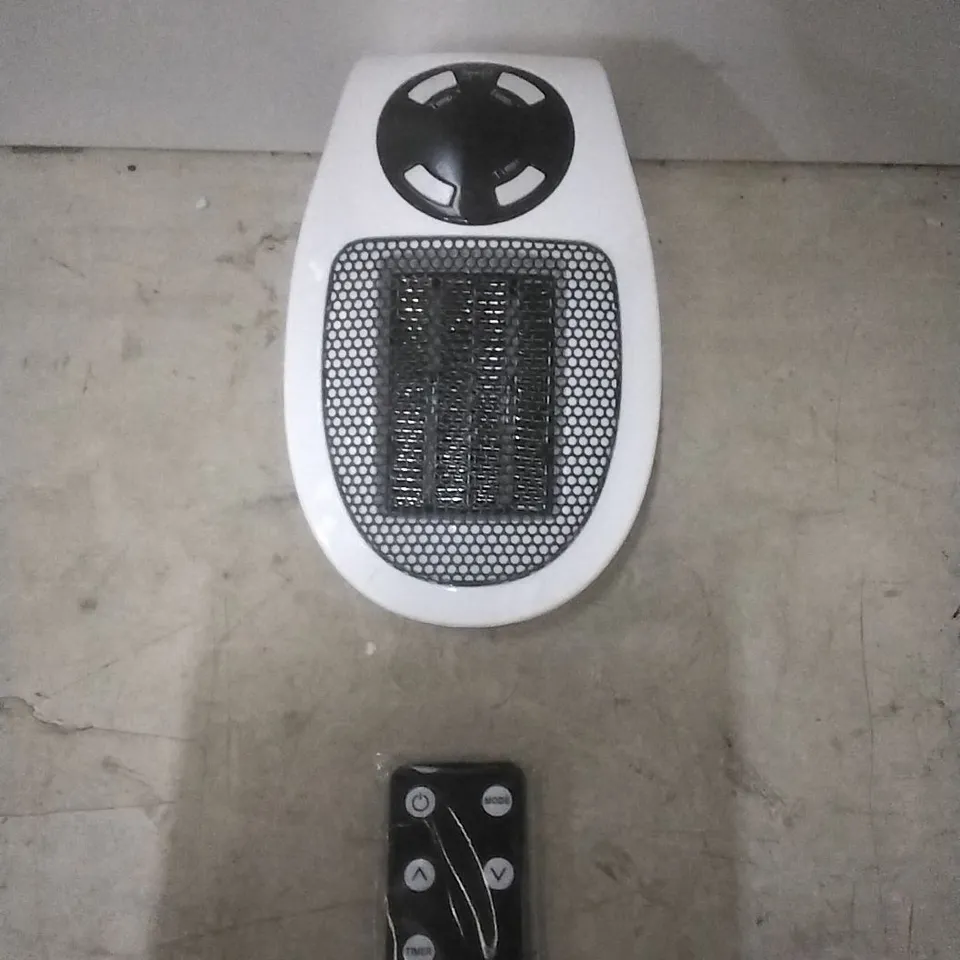 BOXED 2X 500 WATT PLUG IN HEATERS 