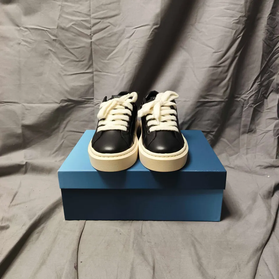 BOXED PAIR OF CLEENS BLACK LEATHER LOW-TOP SNEAKER - SIZE 10.5