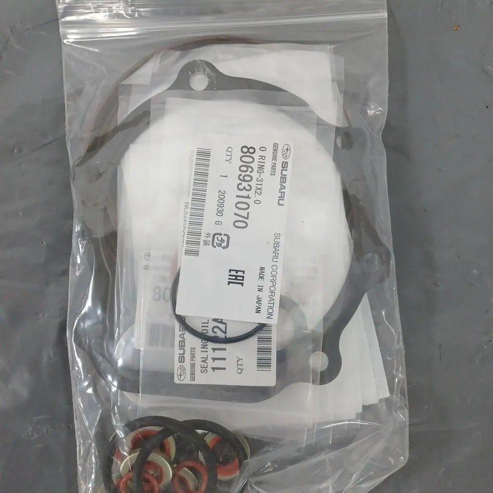 BOX OF SUBARU GENUINE PARTS TO INCLUDE - O-RINGS - GASKETS - BOLTS 