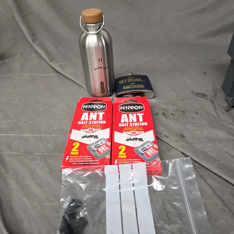 APPROXIMATELY 15 ASSORTED HOUSEHOLD ITEMS TO INCLUDE - BOTTLES , WHISKEY FLASK , ANT BAIT STATIONS , ETC