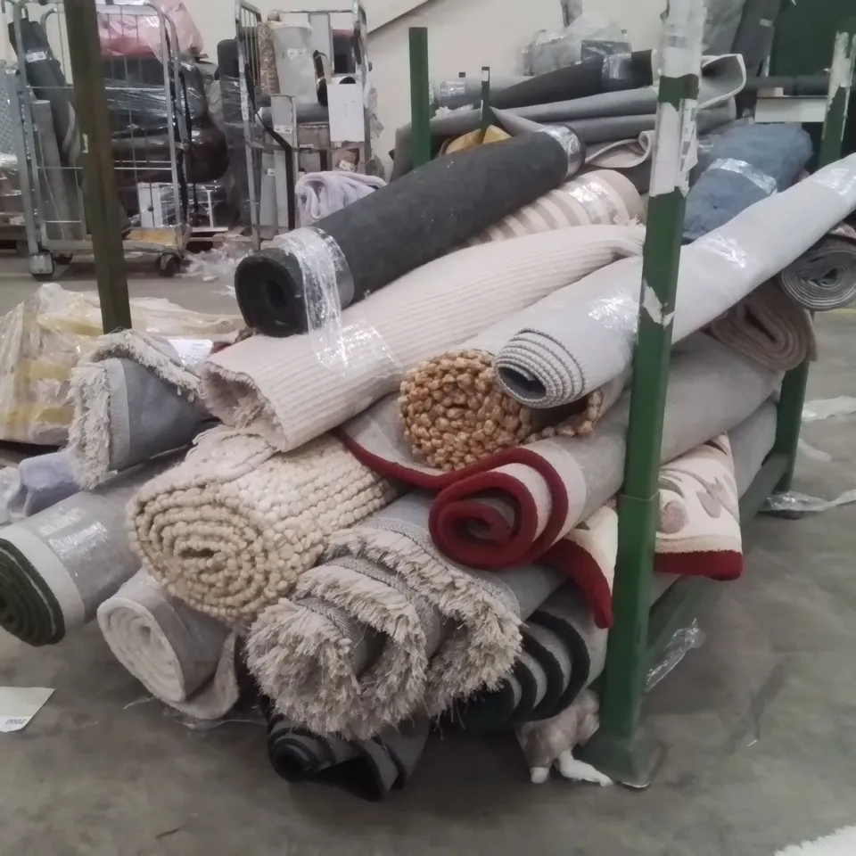 STILLAGE OF APPROXIMATELY 20 QUALITY DESIGNER RUGS