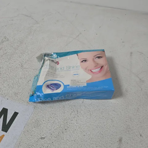 BOX OF APPROXIMATELY 30 ASSORTED ITEMS INCLUDING TEETH WHITENING KIT , DRAGON HEAD BRACELET AND VARIOUS CLOTHING ITEMS