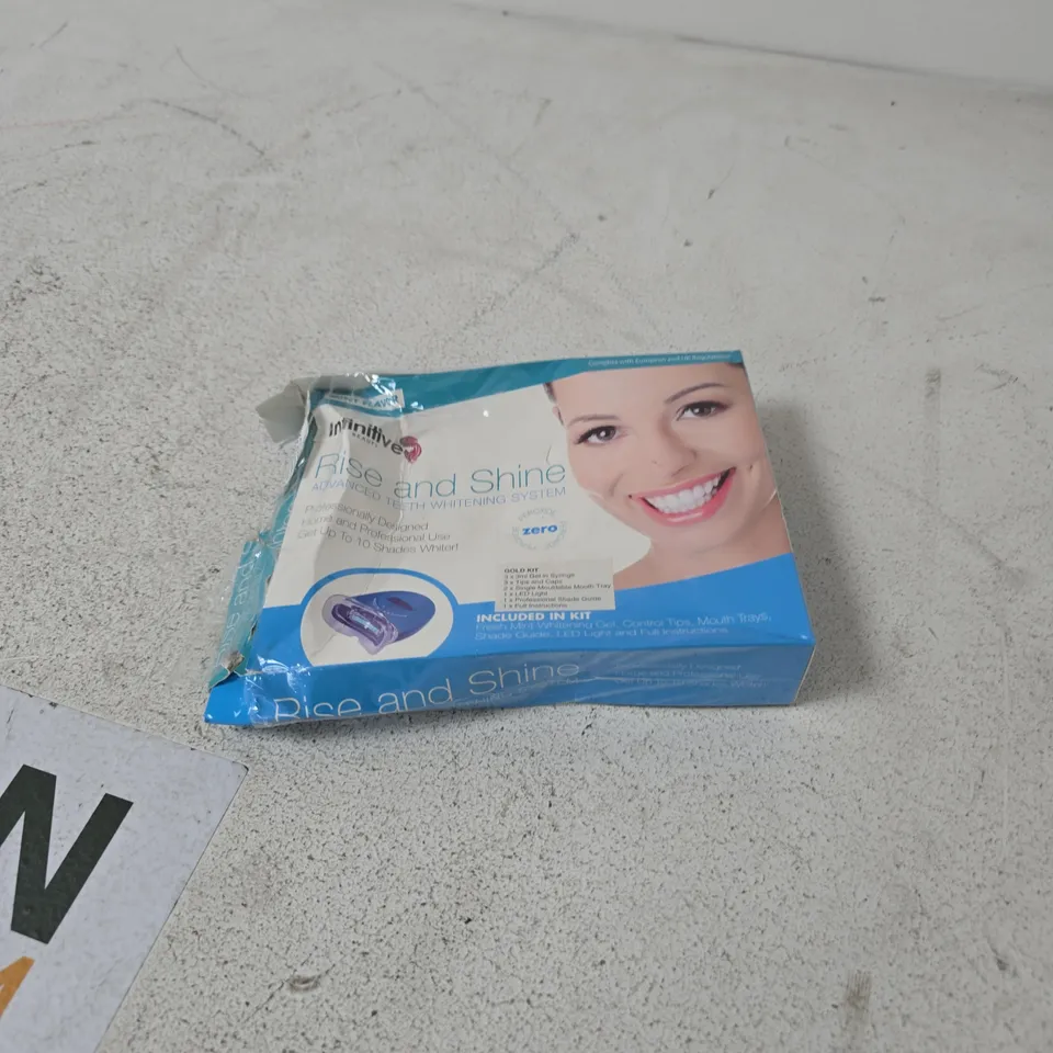BOX OF APPROXIMATELY 30 ASSORTED ITEMS INCLUDING TEETH WHITENING KIT , DRAGON HEAD BRACELET AND VARIOUS CLOTHING ITEMS