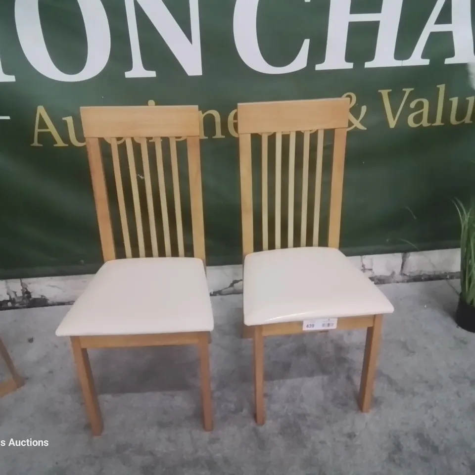 PAIR BALI OAK DINING CHAIRS IVORY SEAT PADS