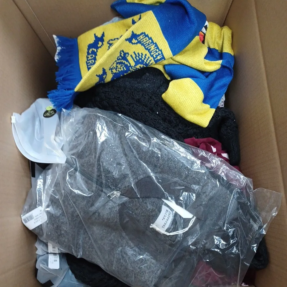 box of approximately 15 assorted clothing items to include penguin boxer set, east pants, carpe diem football scarf etc