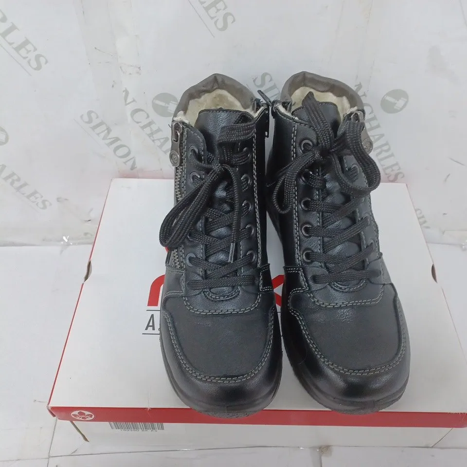 BOXED PAIR OF RIEKER WATER RESISTANT BOOTS IN BLACK SIZE 5