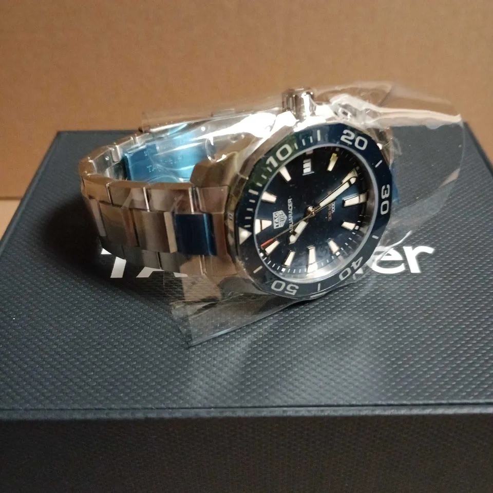 TAG HEUER STAINLESS STEEL WATCH WITH BLUE BEZEL 