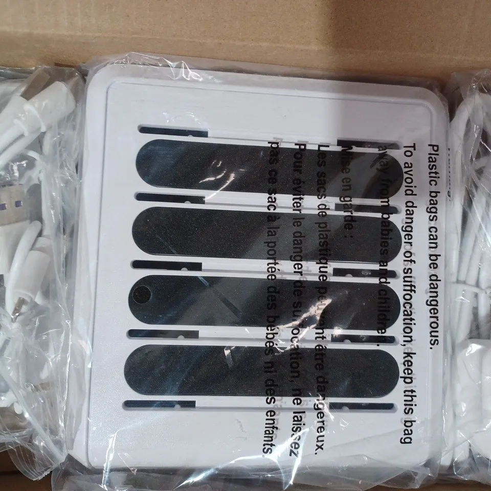 BELL & HOWELL MULTI DEVICE USB CHARGING STATION WITH 4 USB PORTS AND 4 CABLES