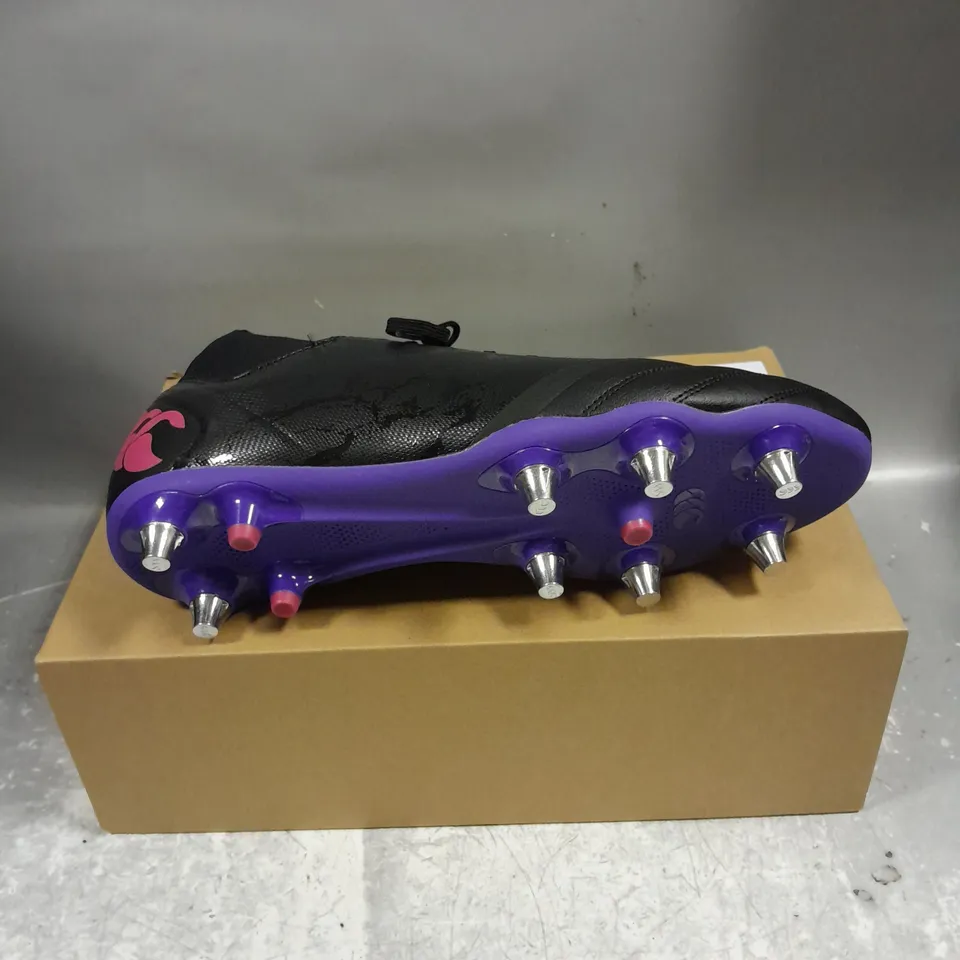 BOXED PAIR OF CANTERBURY STAMPEDE PRO SG AU RUGBY BOOTS IN BLACK/PURPLE SIZE UK 12