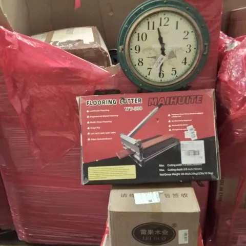 PALLET CONTAINING VARIOUS ASSORTED BOXED HOUSEHOLD ITEMS TO INCLUDE: FLOORING CUTTER, WALL CLOCK, TURNTABLE HI-FI SYSTEM AND LOTS MORE UNMARKED BOXED ITEMS 