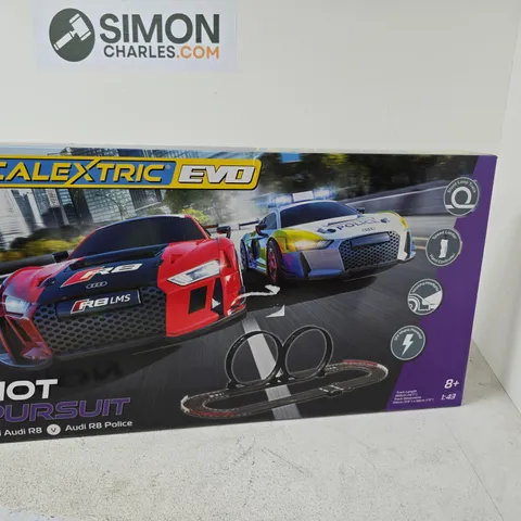 SCALEXTRIC EVO HOT PURSUIT SLOT CAR SET – RED AUDI R8 & POLICE CAR (1:43) – BOXED
