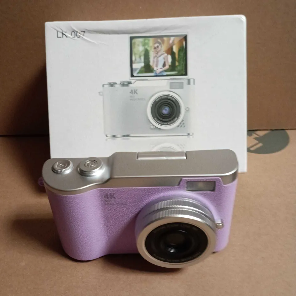 PURPLE COMPACT DIGITAL CAMERA WITH 4K CAPABILITY 