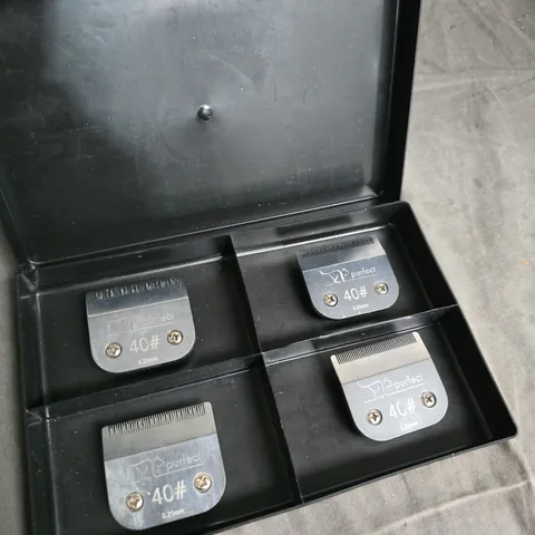 A SET OF SHEAR EASE , PURFECT CLIPPER BLADES IN SIZES 40# 0.25MM.