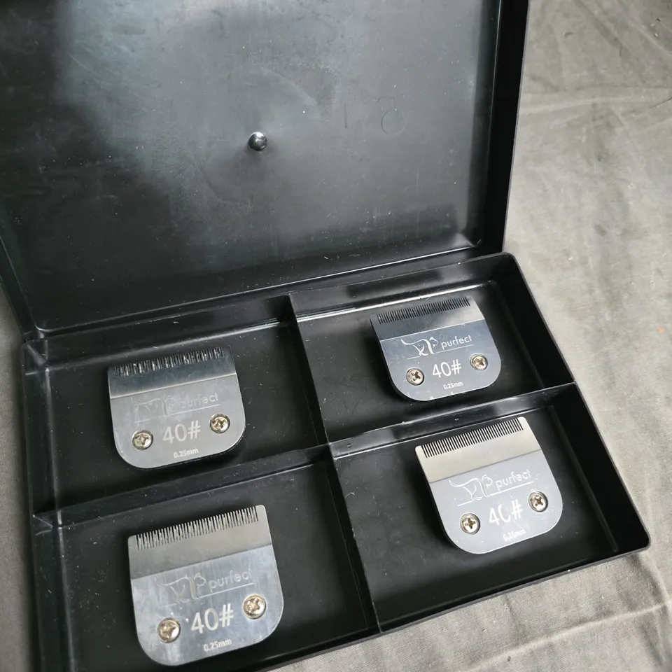 A SET OF SHEAR EASE , PURFECT CLIPPER BLADES IN SIZES 40# 0.25MM.