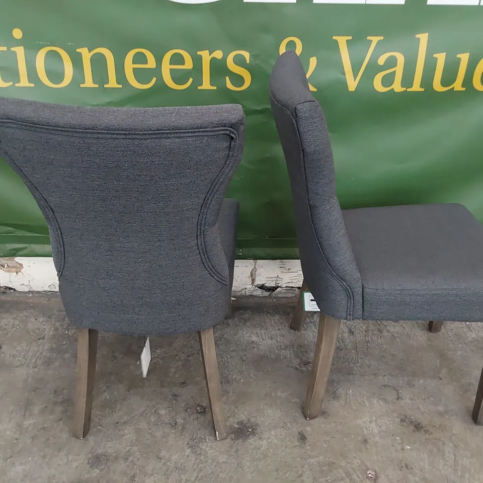 PAIR UPHOLSTERED BUTTONED BACK DINING CHAIRS CHARCOAL FABRIC ON SILVERED LEGS 