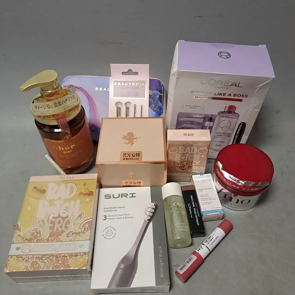 APPROXIMATELY 15 ASSORTED COSMETIC PRODUCTS INCLUDE - L'OREAL BEAUTY ESSENTIALS ROUTINE - PLOUISE BAD BITCH ENERGY BODY MIST IN PEACH - FINO PREMIUM TOUCH HAIR MASK - ETC