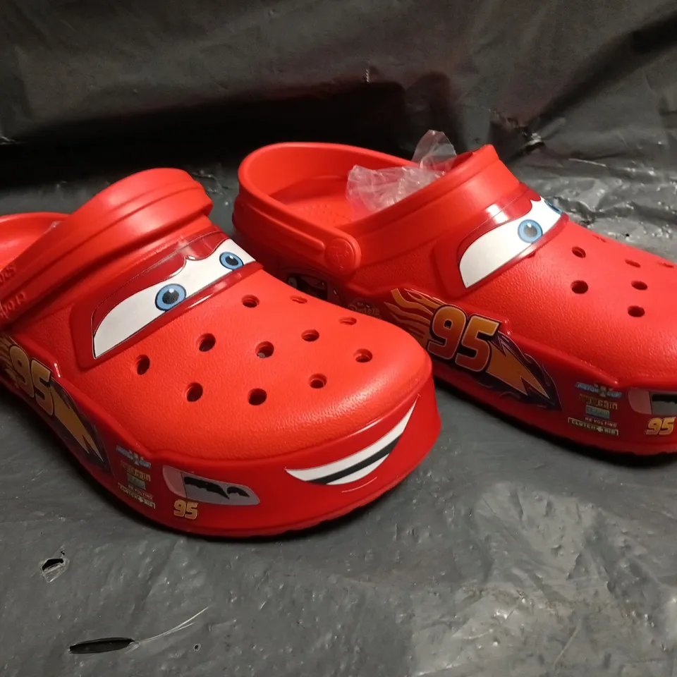 PAIR OF CROCS LIGHTNING MCQUEEN CLOGS SIZE M5/W6