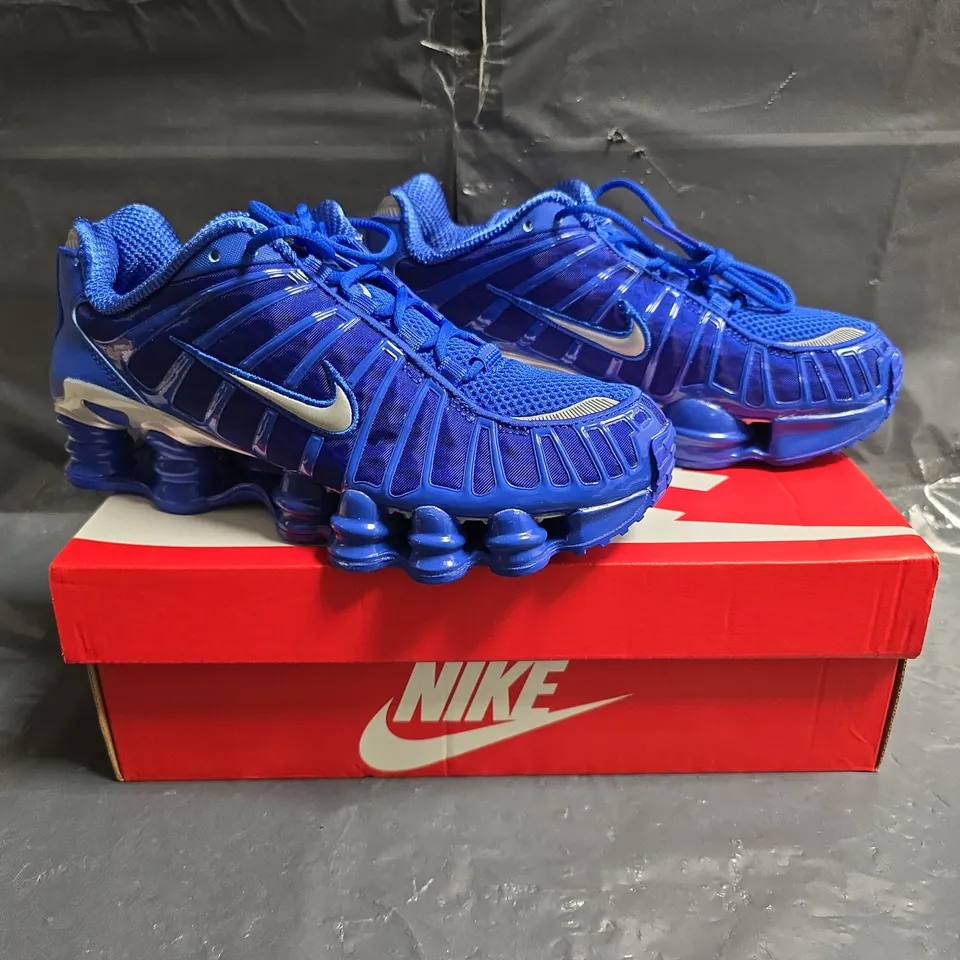 BOXED PAIR OF NIKE SHOX TRAINERS IN BLUE SIZE UK 6