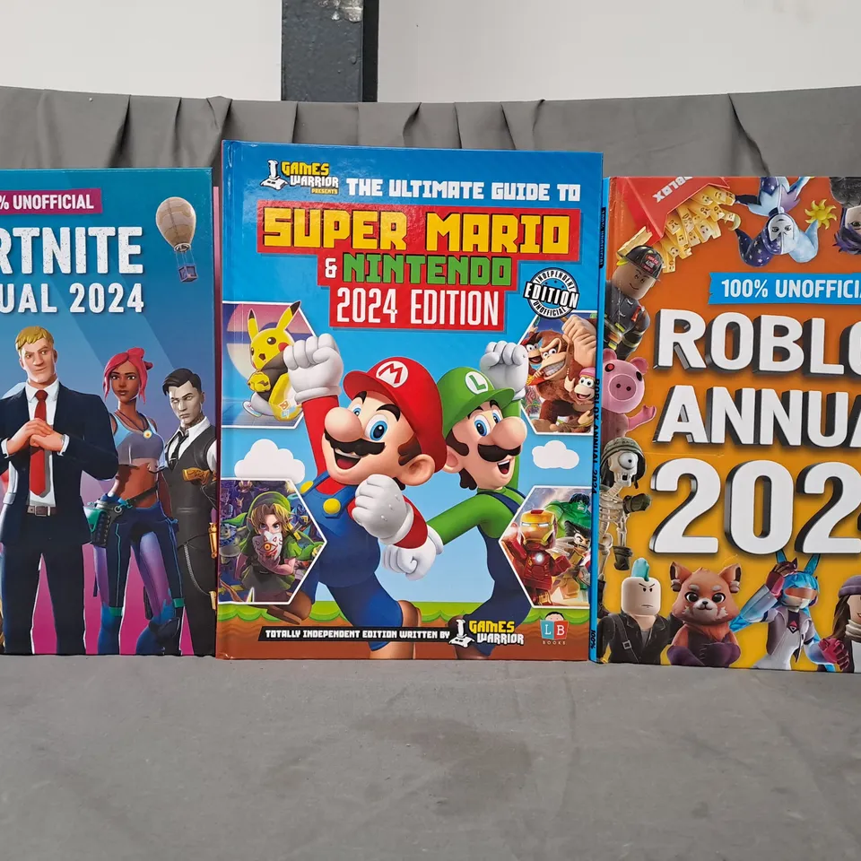 BOX OF APPROXIMATELY 10 ASSORTED BOOKS TO INCLUDE FORNITE 2024 ANNUAL, THE ULTIMATE GUIDE TO SUPER MARIO & NINTENDO 2024 EDITION, ROBLOX 2024 ANNUAL, ETC