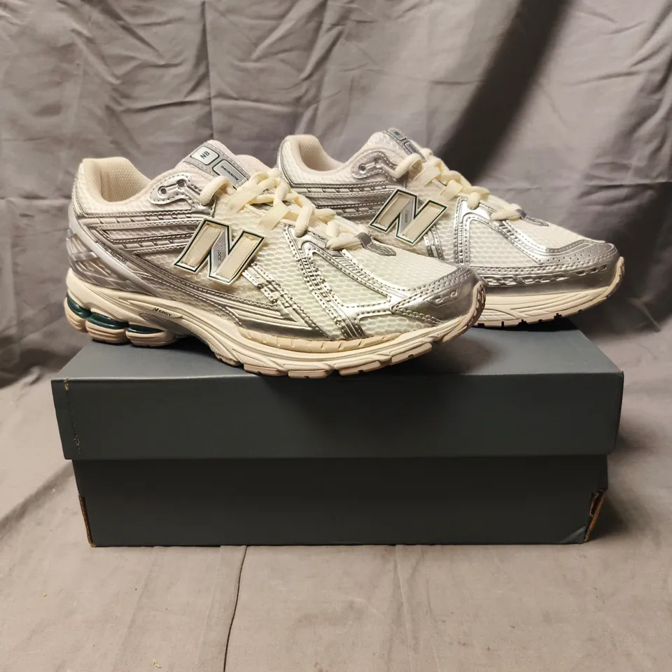 BOXED PAIR OF NEW BALANCE 1906 TRAINERS IN CREAM/SILVER SIZE UK 10