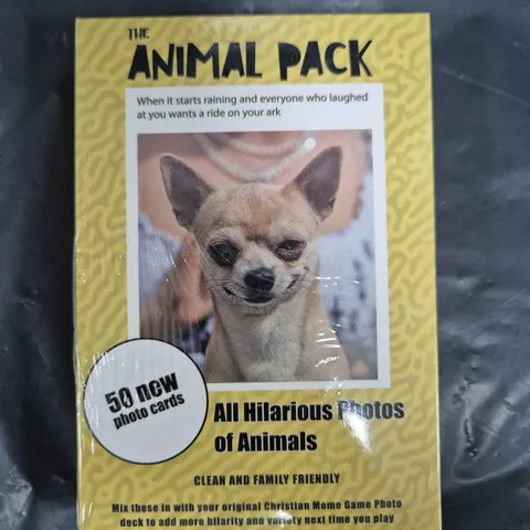 BOX OF APPROXIMATELY 15 SEALED ANIMAL PHOTO CARD PACKS FOR THE CHRISTIAN MEME GAME