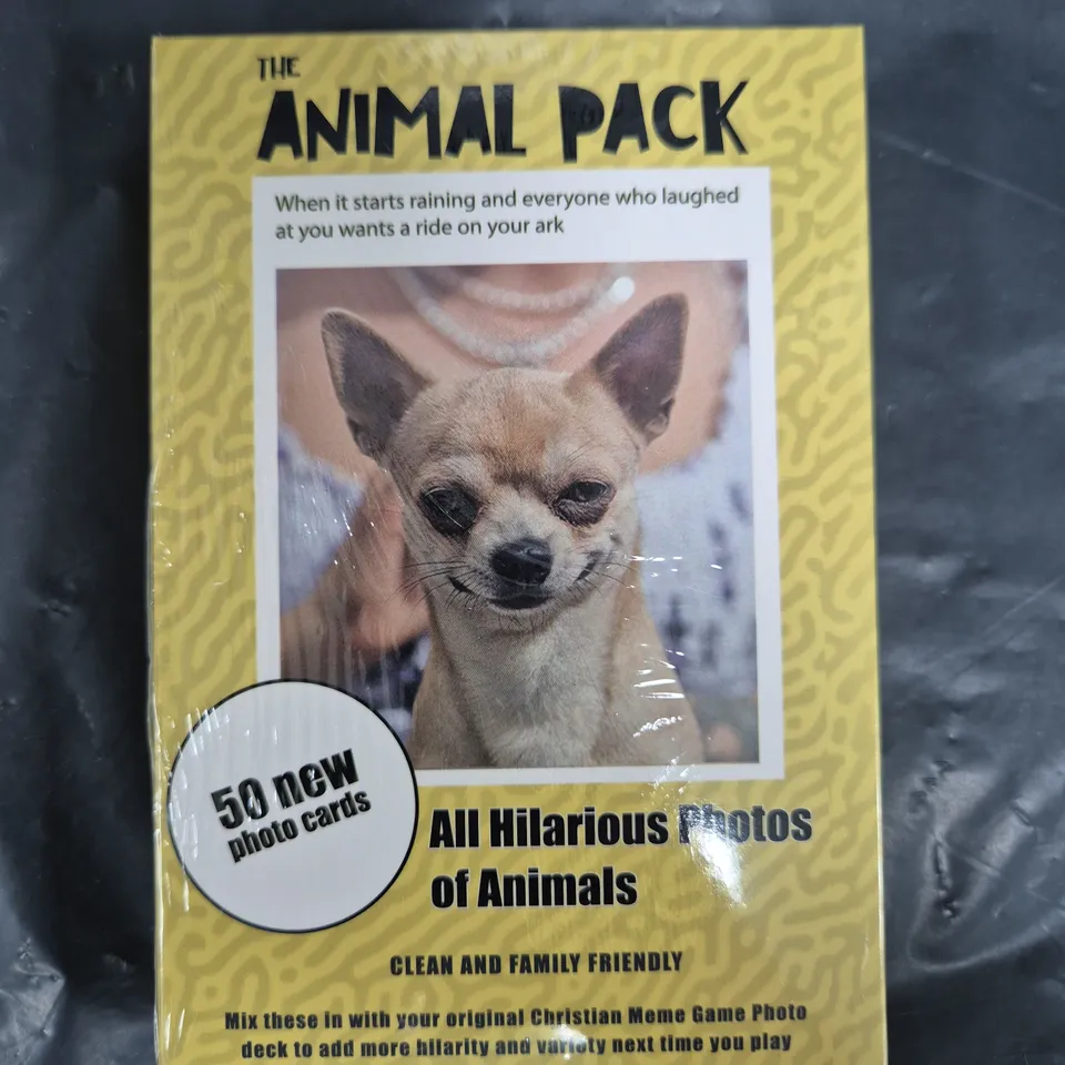 BOX OF APPROXIMATELY 15 SEALED ANIMAL PHOTO CARD PACKS FOR THE CHRISTIAN MEME GAME