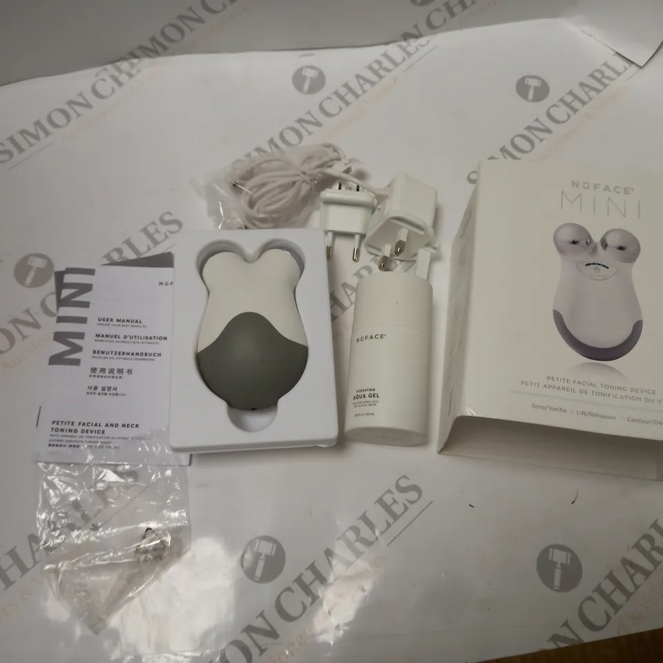 BOXED NUFACE PETITE FACIAL TONING DEVICE WITH ACCESSORIES AND INSTRUCTIONS