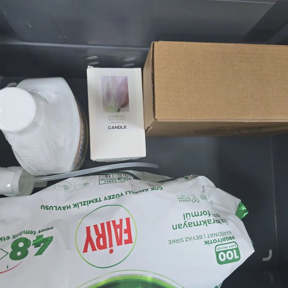 APPROXIMATELY 6 ASSORTED HOUSEHOLD ITEMS TO INCLUDE THE PINK STUFF, SCENTED CANDLE, ETC